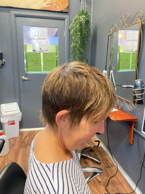 A short textured cut finished in the salon chair